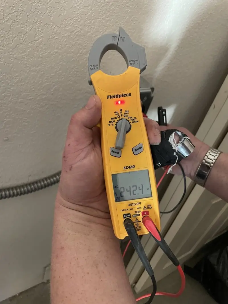 Voltage testing with clamp meter during Circuit Breaker Repair in Dunellen